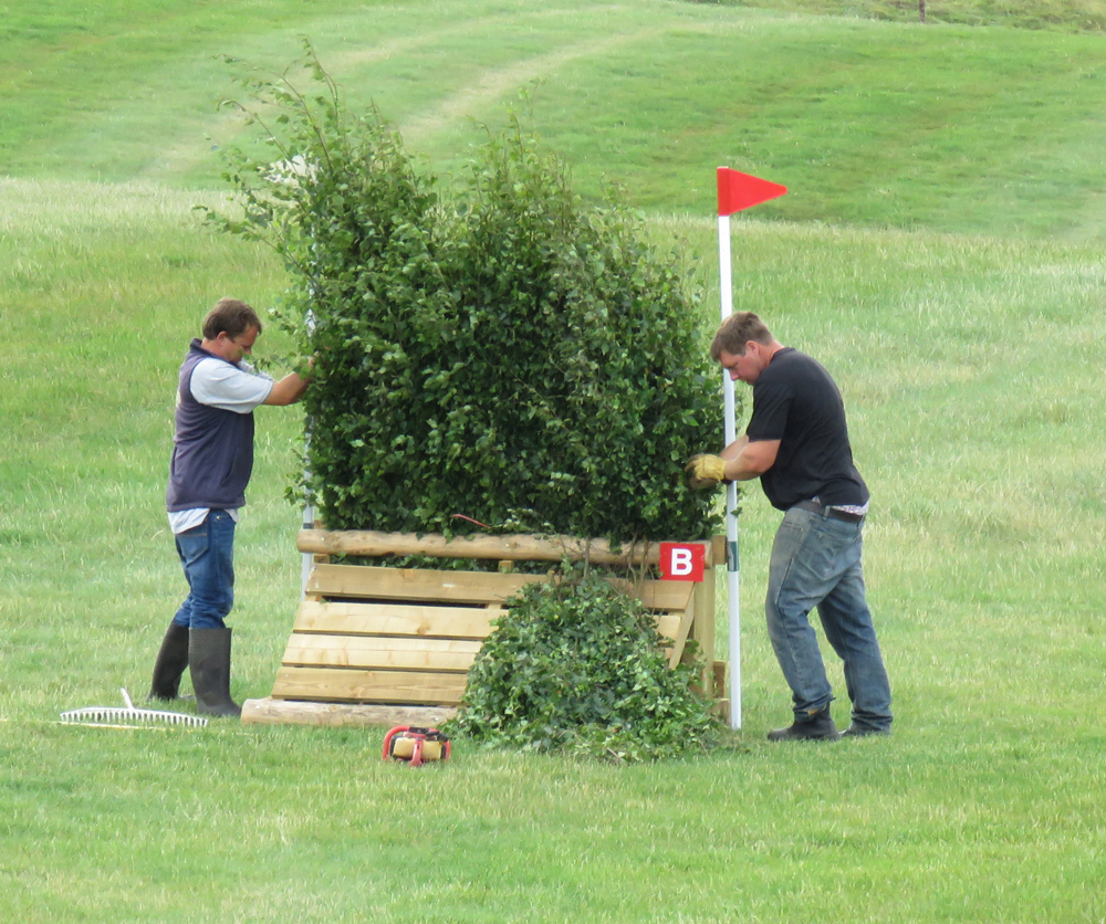 Ashley Willis and Stewart Roberts at work on a cross-country jump