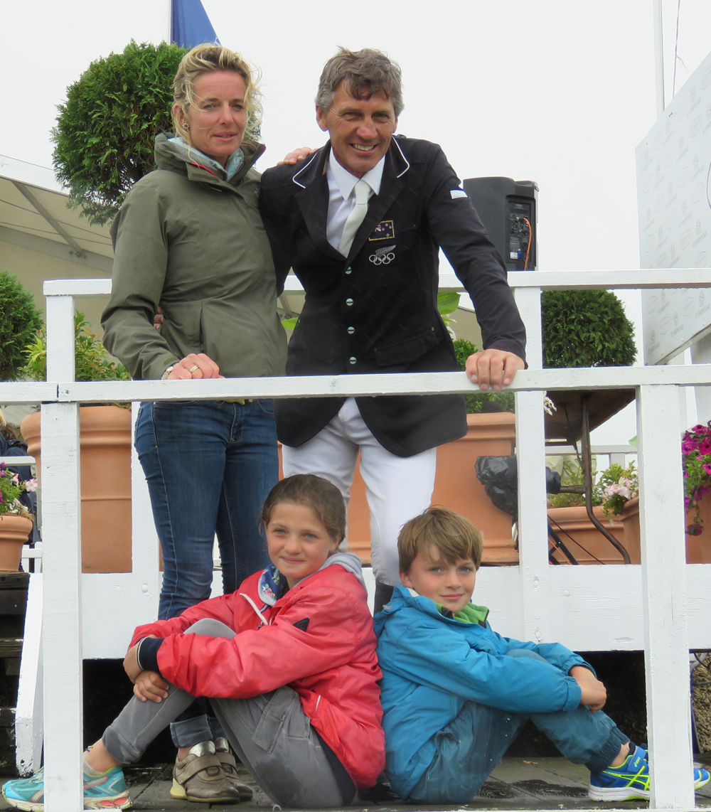 A celebratory family group: Andrew with his wife Wiggy and children Lily and Zach