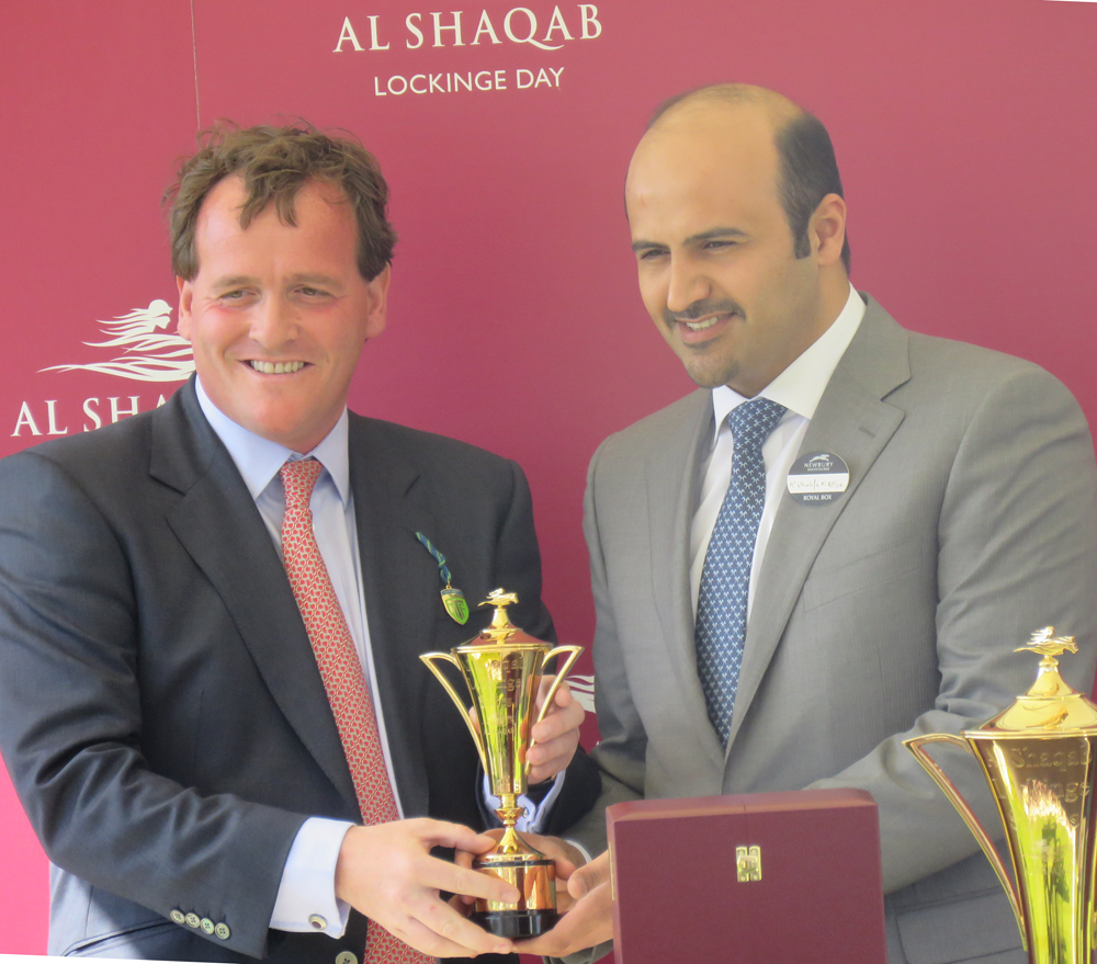 Richard Hannon receives his Lockinge trophy