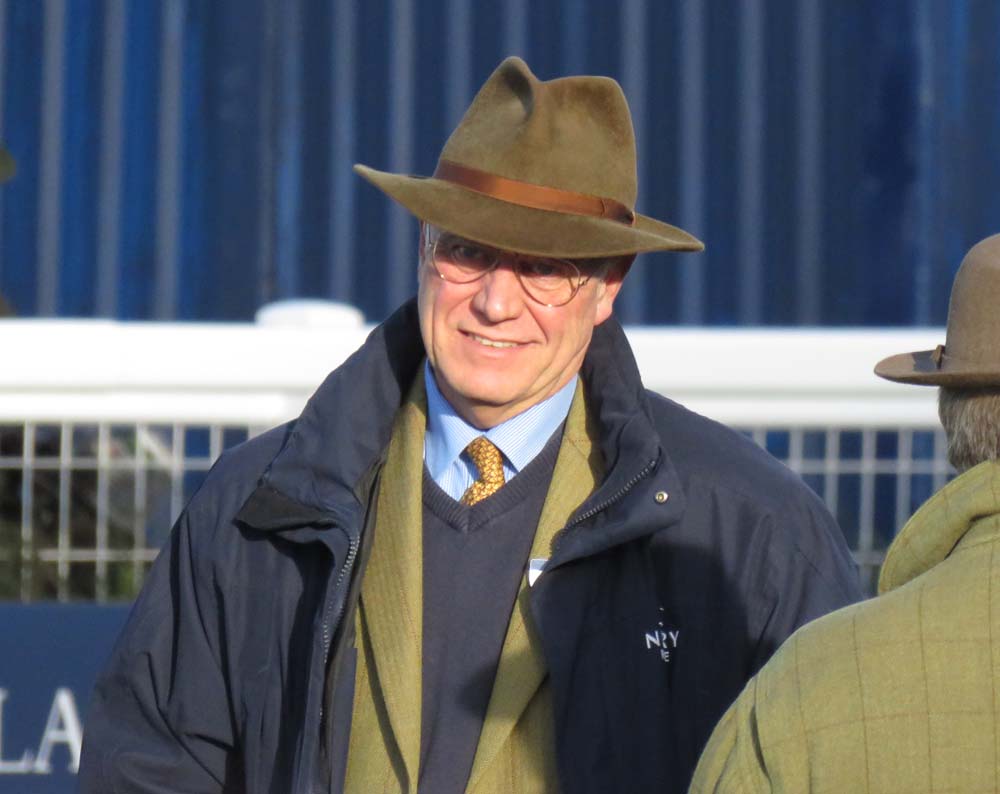 The trademark trilby: Richard Osgood on duty at Newbury's pre-Christmas meeting - 19 December 2018