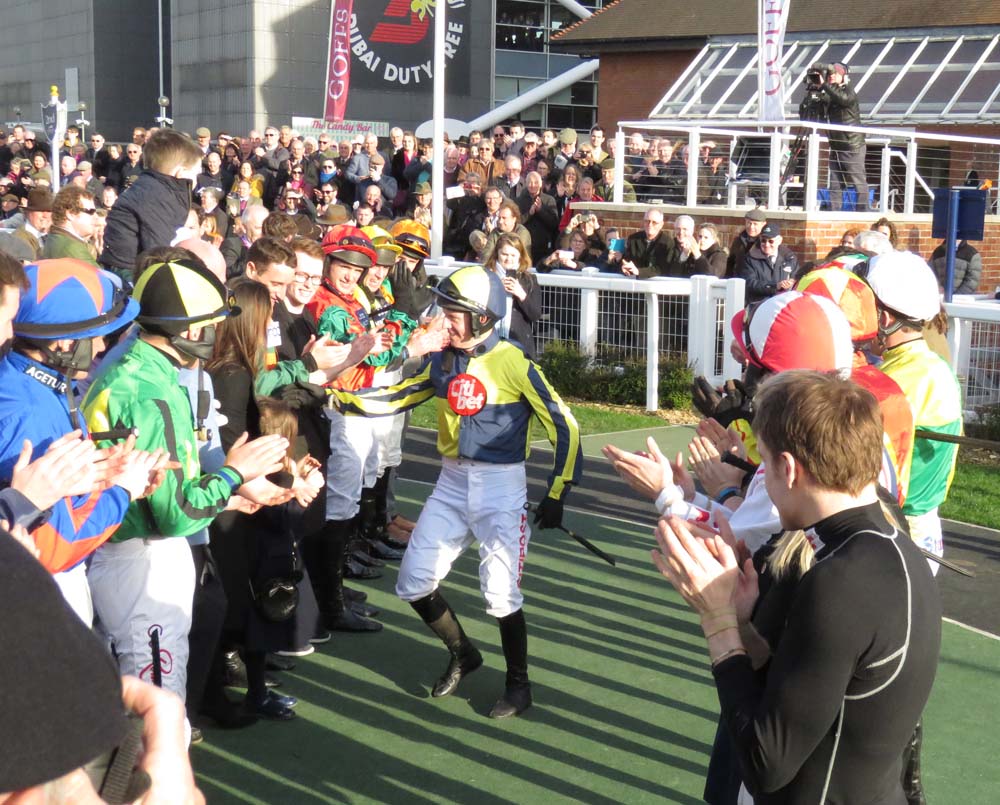 Noel Fehily spots his wife among his fellow jockeys in their guard of honour 