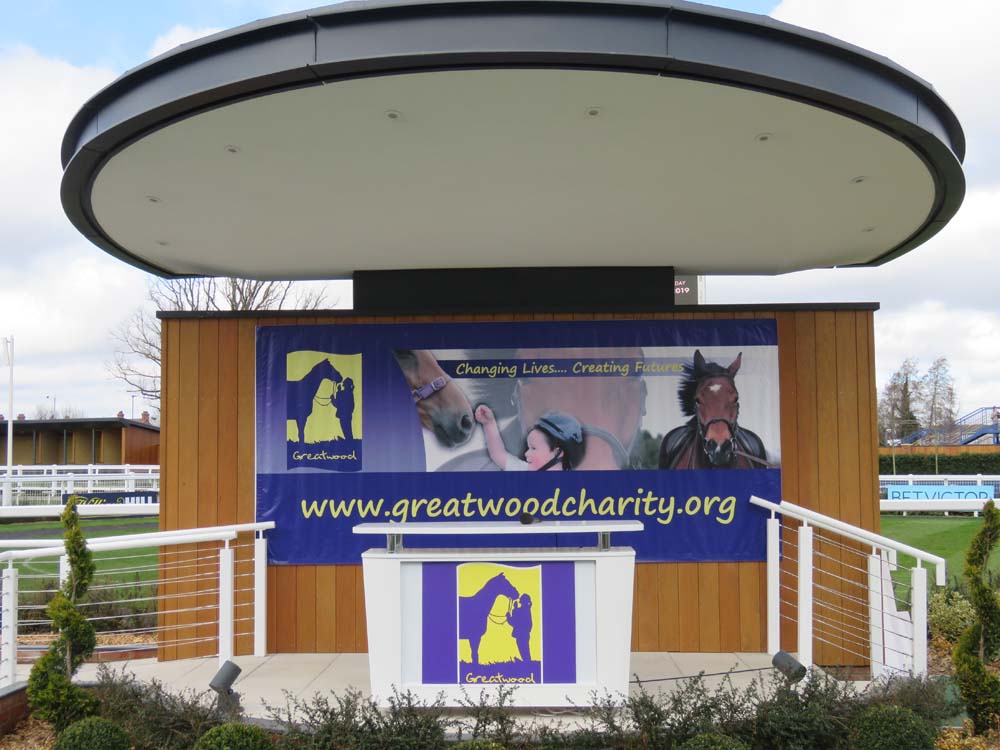 Newbury's presentation podium dressed for the Greatwood Charity Raceday 