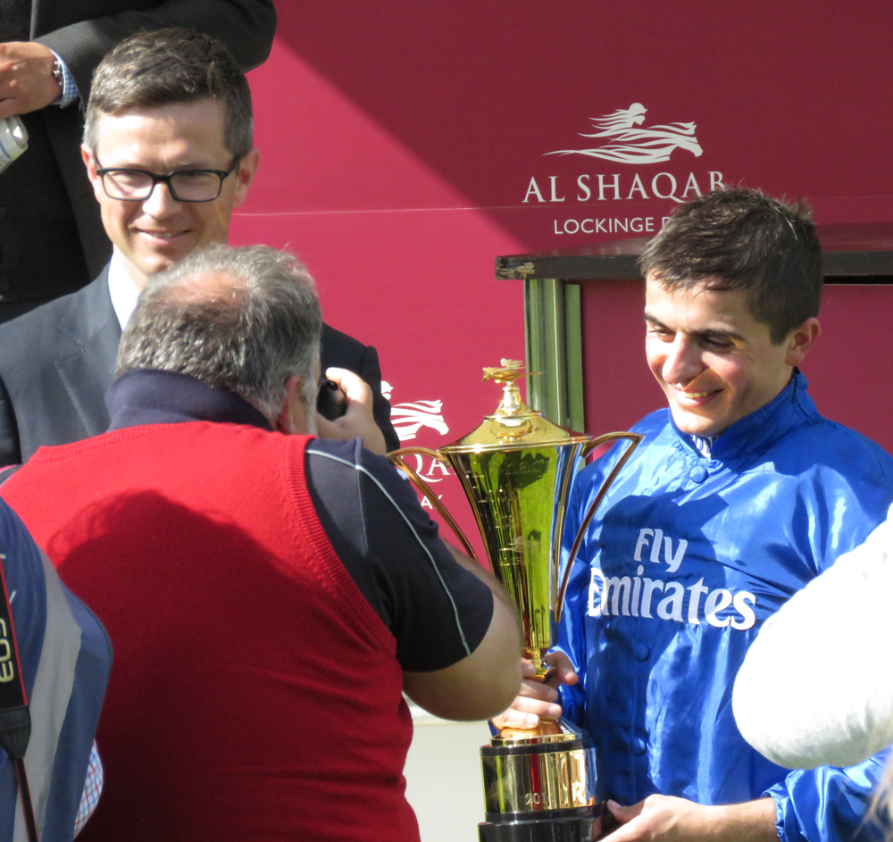 Andrea Atzeni with the cup - Roger Varian at left