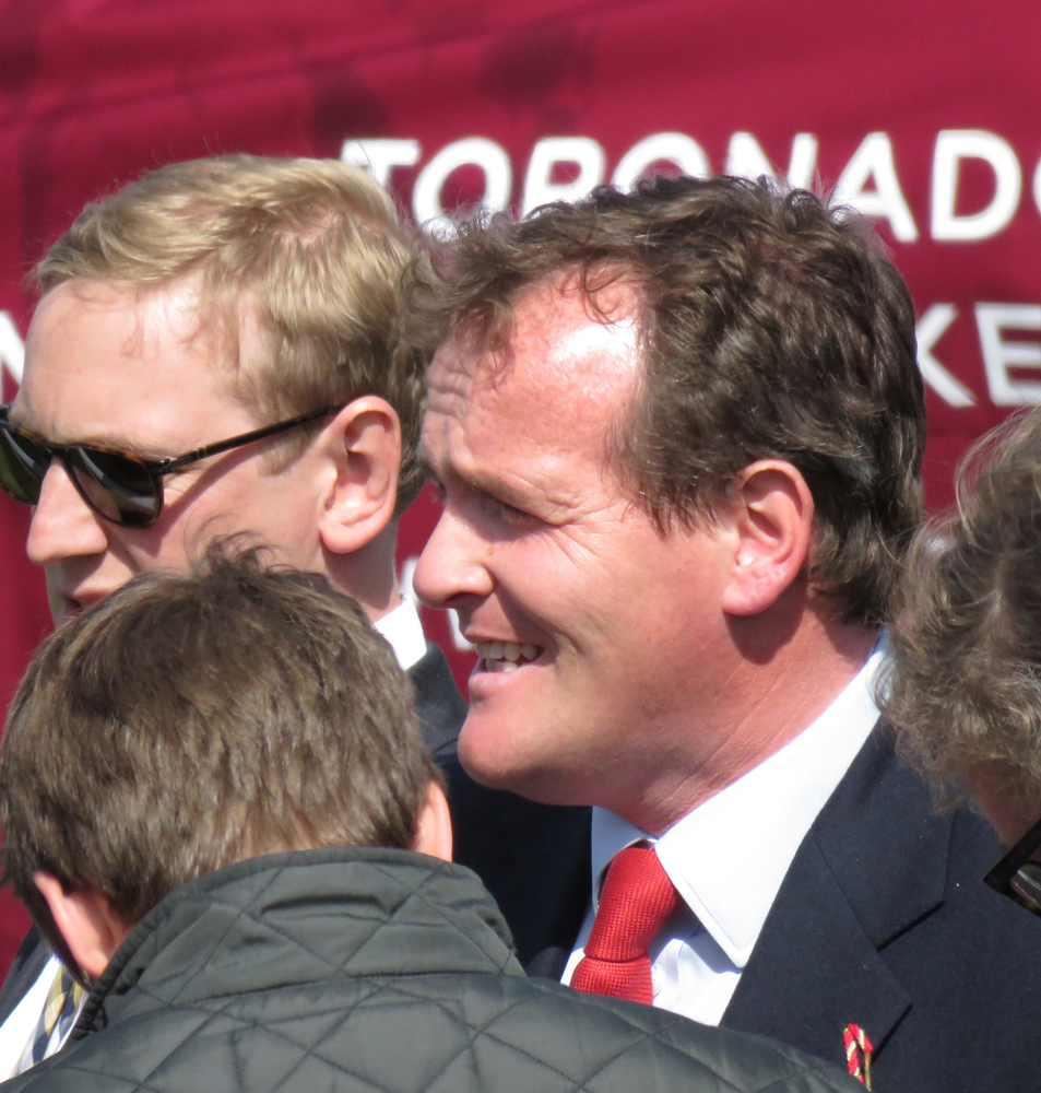 Richard Hannon talks reporters through his win in the Toronado