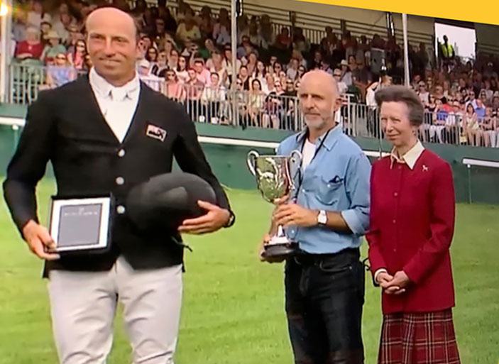 Tim Price having been awarded his third place prize by Princess Anne