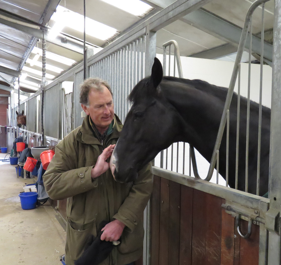 Roger Charlton with 2-year-old Sfumato in the new barn