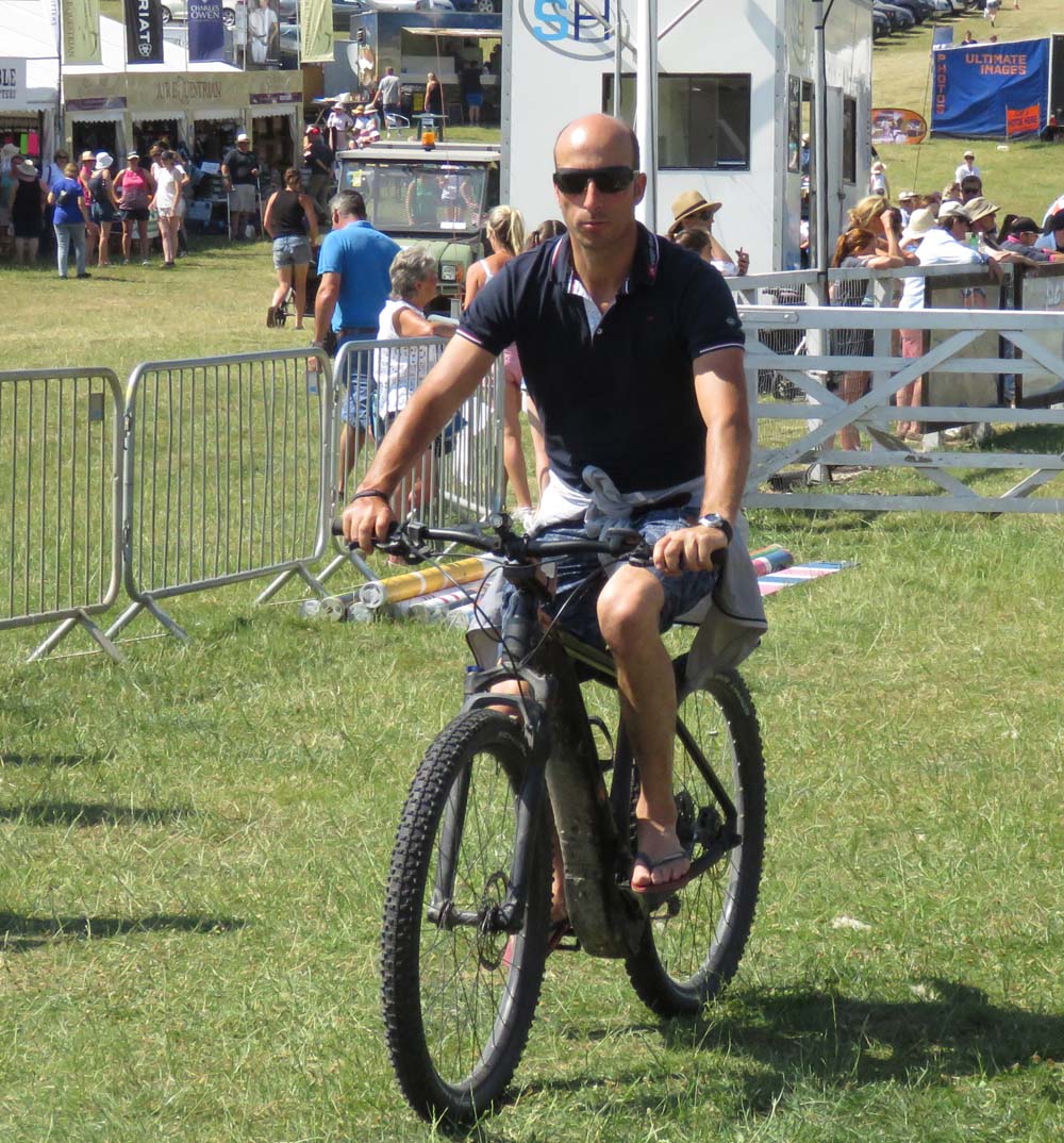 Tim Price takes to his bicycle to get around the Barbury Horse Trials